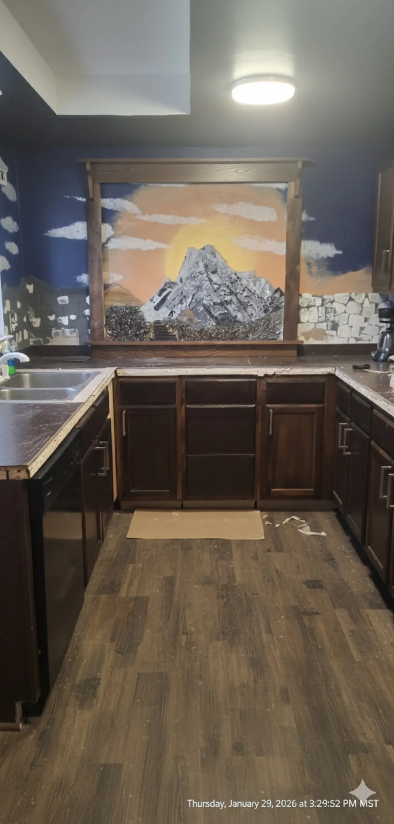 Kitchen mountain mural mosaic in progress on the bench